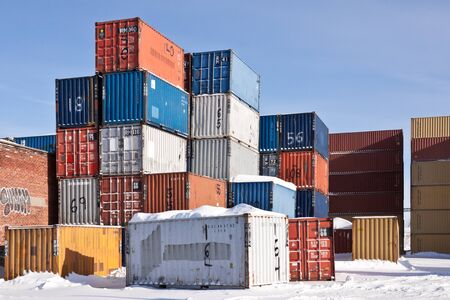 Different color containers in a storage space in a sunny winter dayのeditorial素材