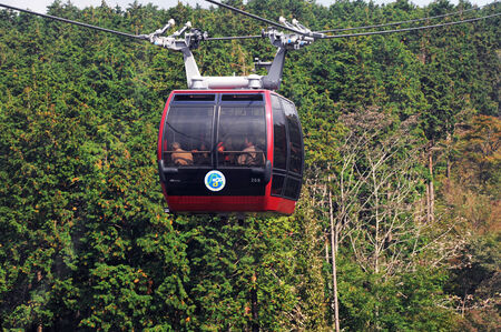 a cable car with a green backgroundのeditorial素材