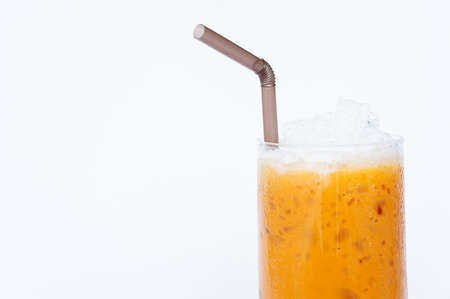 Thai tea "cha-yen" cold tea" in Thailand, is a drink made from strongly-brewed black tea.の写真素材