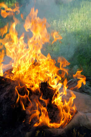 Light a fire ,in the outside area. May create a hazard to those nearby. be carefulの写真素材