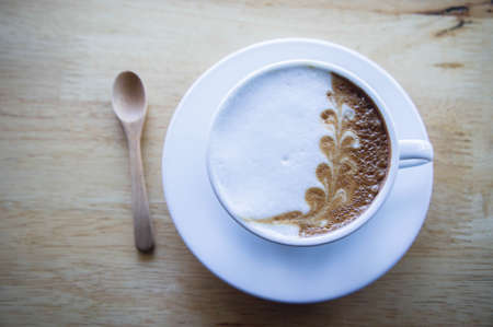 coffee cup on wood table in cafe coffee shopの写真素材