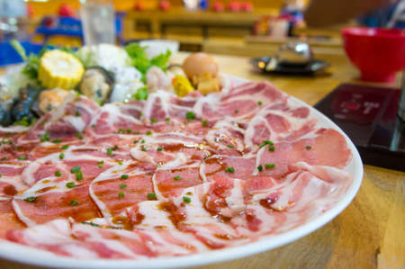 Vegetable and meat slides set in food shopの写真素材