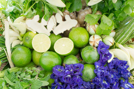 Different raw vegetables lime background , Healthy eating , organic vegetables herb and pea flowersの写真素材
