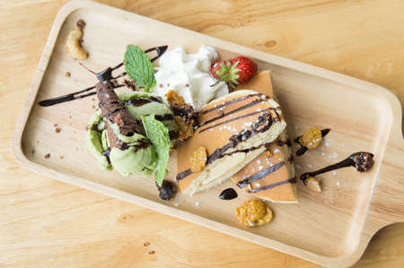 green tea ice cream homemade dessert on wood tableの写真素材