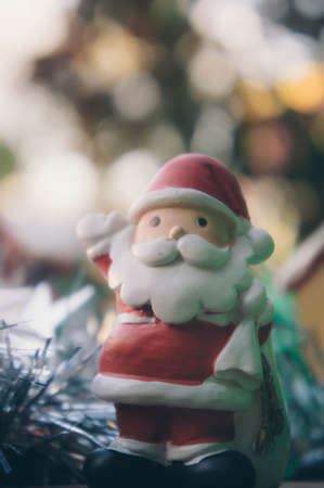 Christmas light and Santa dolls background vintage styleの写真素材