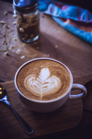 coffee cup and tasty cake on wood table and Blank paper waiting for ideas , coffee time workの写真素材