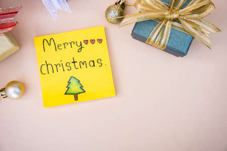 christmas background  and paper note merry christmas decor on backgroundの写真素材