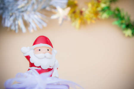 santa claus doll christmas background and gift box and copy spaceの写真素材