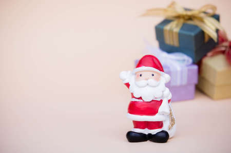 santa claus doll christmas background and gift box and copy space