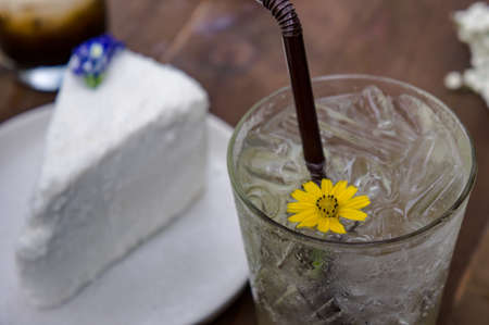 coconut cake dessert on wood table , tasty cake