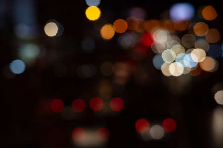 Bokeh night light on the avenue Light night at city blue bokeh sky festival abstractの写真素材