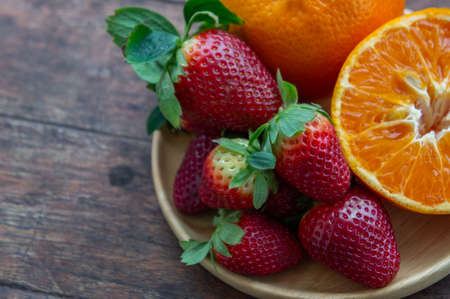Strawberry and orange fruit vitamin diet for healthy