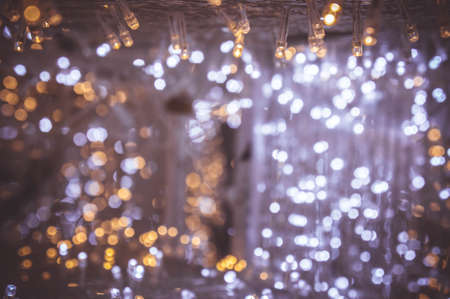 The night light bokeh festival with small LED light decor on party night christmas or new year