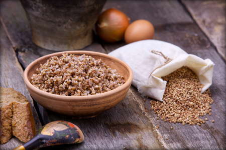 Buckwheat on the old desk Russian foodの写真素材