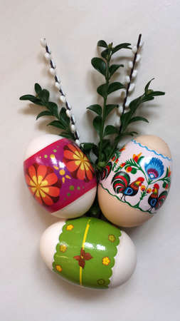 Easter eggs with boxwood and catkins