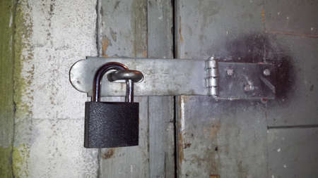 Door locked for a padlock