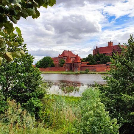 Malbork, Poland - June 25, 2020: Castle in Malbork on the Nogat River, Poland