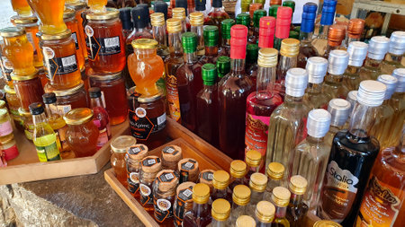 Crete, Greece - June 20, 2019: Delicious, healthy traditional Greek products. Honey, meads and creams.のeditorial素材