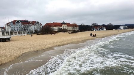 Sopot, Poland - January 3, 2021: View on famous Grand Hotel from Sopot pier, beach on the seashore, Baltic Seaのeditorial素材