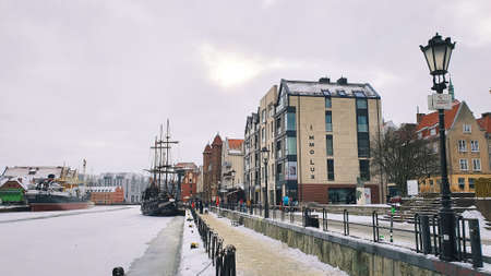 Gdansk, Poland - February 7, 2021: View of Gdansk old Town from the Motlawa River, Poland. Ancient European city. Winter scenery.のeditorial素材