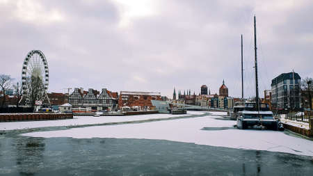 View of Gdansk old Town from the Motlawa River, Poland. Ancient European city. Winter scenery.の写真素材
