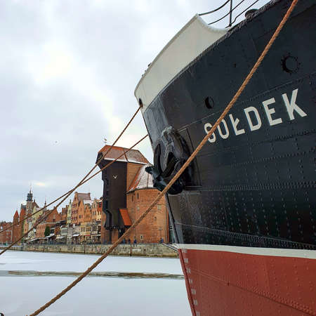 Gdansk, Poland - February 7, 2021: Museum bulk carrier ship Soldek moored at Old Motlawa River...