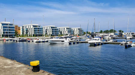 Gdynia, Poland - July 4, 2021: Motorboats and boats in a new modern marina in Gdynia, Poland.のeditorial素材