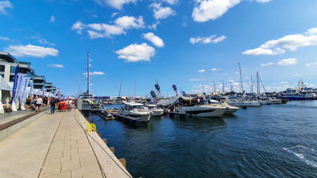 Gdynia, Poland - July 18, 2021: Motorboats and boats in a new modern marina in Gdynia, Poland.のeditorial素材