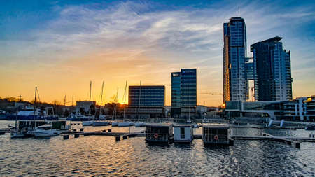 Gdynia, Poland - February 14, 2022: Marina and one of the tallest buildings in Poland, Sea Towers in...