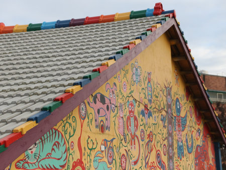 Colorful graffiti on the roof of an old house in the Netherlandsの写真素材