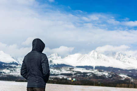 Tatra Mountains in Slovakia. Panorama of the mountain range. Winter in the mountains in nature. Blue and white colors. The tops of the mountains are covered with snow. Far from civilizationの写真素材