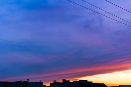 Natural Sunset. Bright Dramatic Sky And Dark Ground. Landscape Under Scenic Colorful Sky. Sun Over Skyline, Horizon. Transcarpathia and Uzhhorod. Magic Sunset. Dusk. Cloudsの写真素材