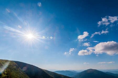 Traveling by the Carpathians. Polonyna Runa, Gostra, and other peaks. Spring, Summer and Autumn rest in the Carpathians. Green, Blue colors. Forest and meadowsの写真素材