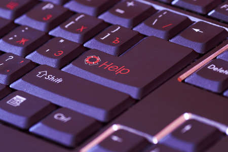Special keyboard for quick support. Black keyboard with a basket icon and a red word shop on enterの写真素材