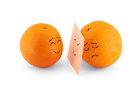 Joy, sadness and lie in orangesの写真素材