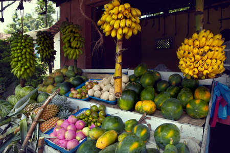 Street fruit vendor at Sri-lanka sells a wide range of tropical fruitsの写真素材