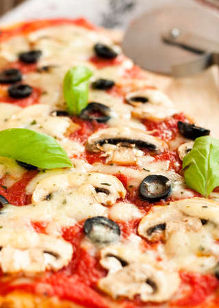 Pizza with mushrooms and cheeseの写真素材