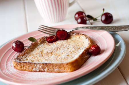 Toasted bread with cherriesの写真素材
