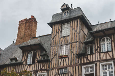 Close up of historic half-timbered houses with chimneys in old town of Rennes (Brittany, France)の写真素材