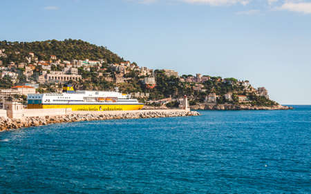 NICE, FRANCE - OCTOBER 13, 2009: White and yellow Corsica ferries - Sardinia ferries passenger ship leaves Port Lympia of Niceのeditorial素材