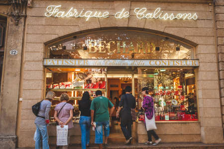 AIX-EN-PROVENCE, FRANCE - OCTOBER 9, 2009: People at famous family run patisserie Bechard which specializes in calissons, traditional French candy of Provenceのeditorial素材