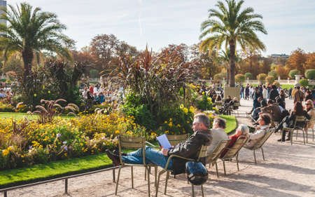 PARIS, FRANCE - OCTOBER 3, 2009: People relaxing and enjoying leisure time in Luxembourg Garden or...