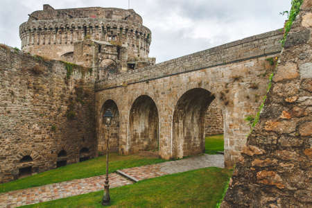 Ancient walls of Chateau de Dinan, medieval castle built in 14th century that consists of keep and ramparts, in Dinan, Brittany, Franceのeditorial素材