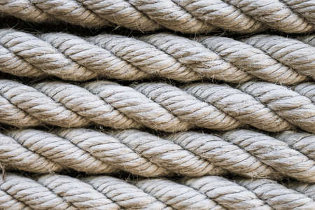 Close up of rows of thick twisted rope cable in lines. For pattern, texture, backgroundの写真素材