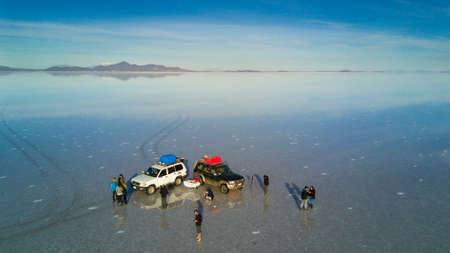 Traveling to Uyuni salt flats along the bolivian "altiplano" an amazing journey from Chile to Bolivia, an awesome AWD along the Andes mountainsの写真素材