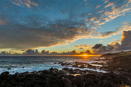 Anakena Beach the most famous beach at Easter Island and maybe the best one in Chile. With it palm trees coming from Polynesia islands and the Ahu Nau Nau Moais is an impressive beach with ancient statues and an amazing natural placeの写真素材