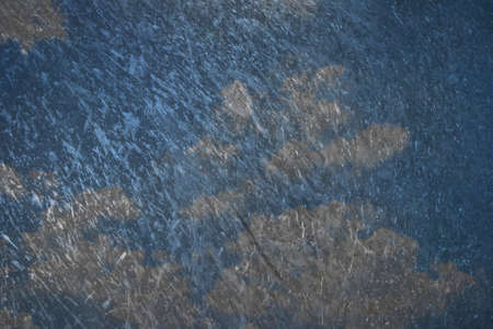 A scratched steel etching of dark rain clouds