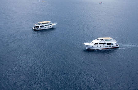 nautical, yachting, summer, ship, yacht, vacations, sea, sailing, vessel, cruise, adventure, club, travel, destinations, gennaker, blu, marina, luxury, freedom, bow, miami, class, equipment, sailboat, entertainment, beach, industrial, exclusion, directionの写真素材