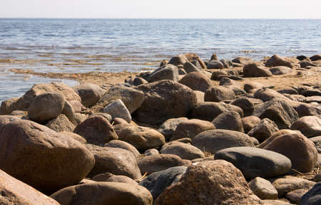 Stones on a background of the  blue seaの写真素材