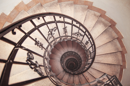 photo of a spiral staircase in an old house